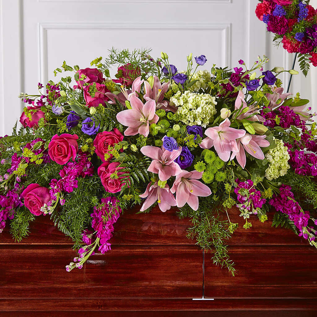 Radiant Tribute Casket Spray – BLOOMERS FLOWER & ASHLEY JO ANTIQUES, Corry PA